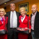Flight Attendants Carrie‐Anne And Julia with Tourism Director, John Lynch, as Regional Head of Sales, Marketing and Communications Andre Bello looks on